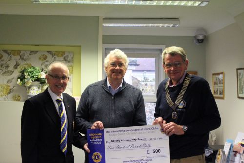 Selsey Lions Club Presnts cheque to Community Forum